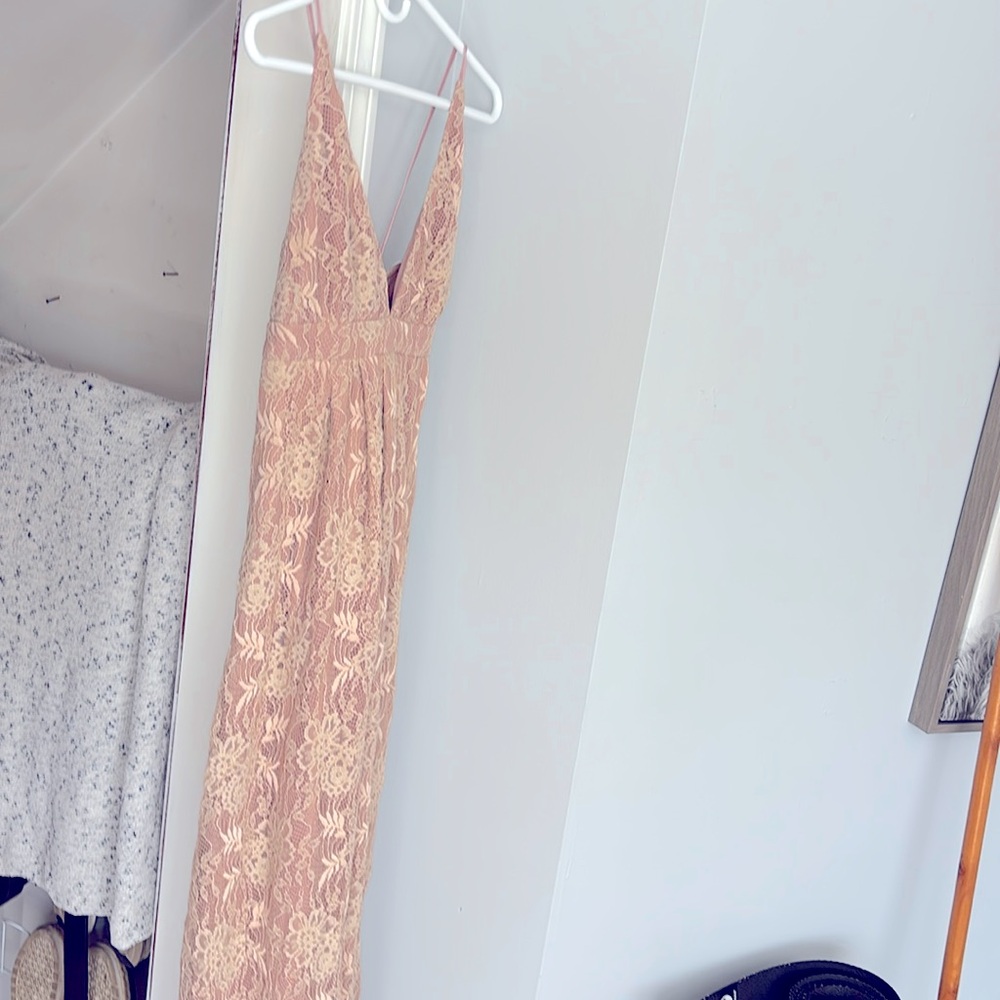 My daughter bought this dress and it has never been worn